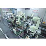 Roboty Kawasaki podczas realizacji testów PCR