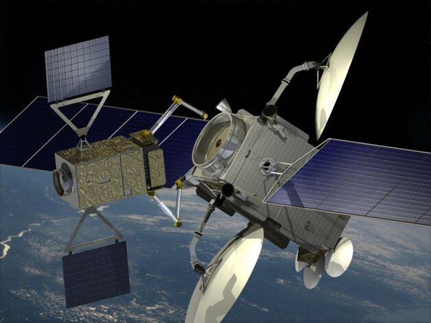 Wizja artystyczna przedstawiająca satelitę telekomunikacyjnego naprawianego przez zrobotyzowany pojazd serwisowy wykorzystujący urządzenia PIAP Space
