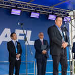 Jaxon Lang, AFL President and CEO (Front), (Left to Right) Naoki Okada, Director, President and CEO Fujikura Ltd. and Jaroslaw Zieba- Deputy Mayor of Gliwice. (Photo: Business Wire)